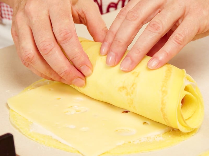 Nidi di crespelle prosciutto e formaggio - Step 14