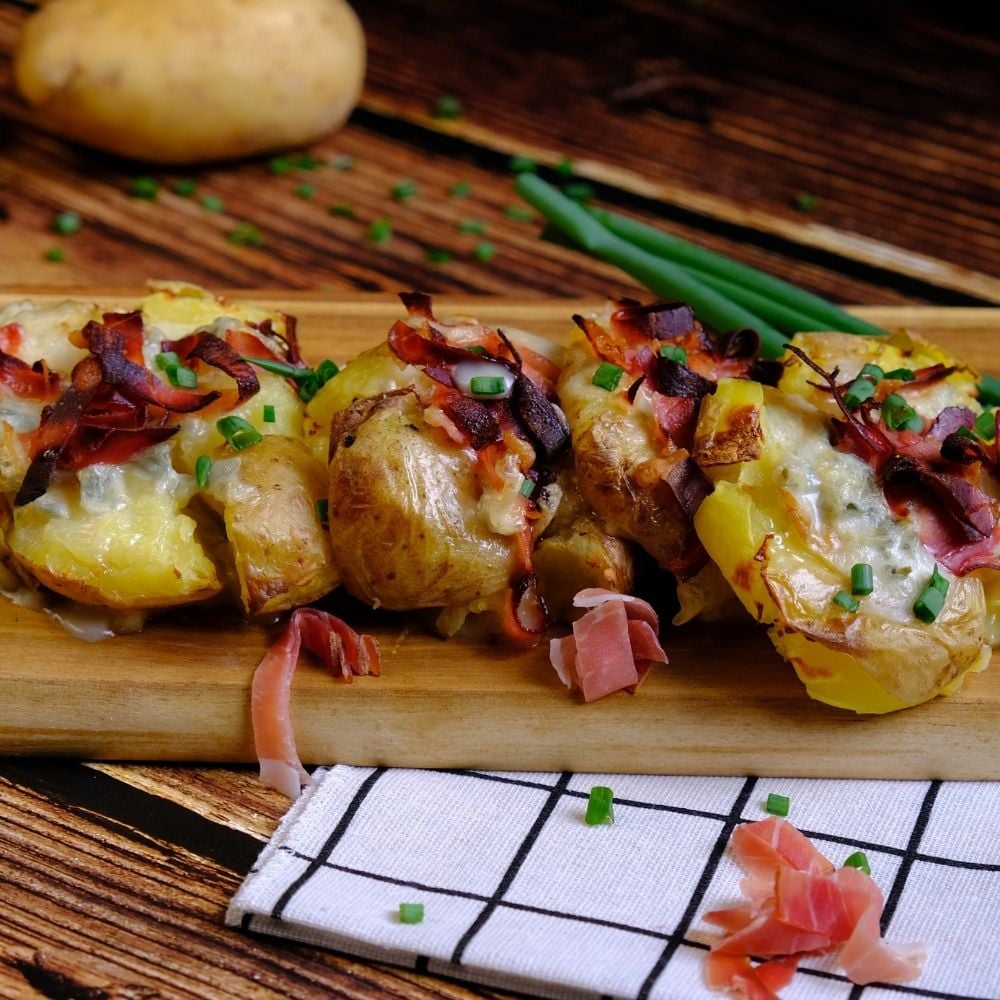 patate schiacciate gorgonzola e speck
